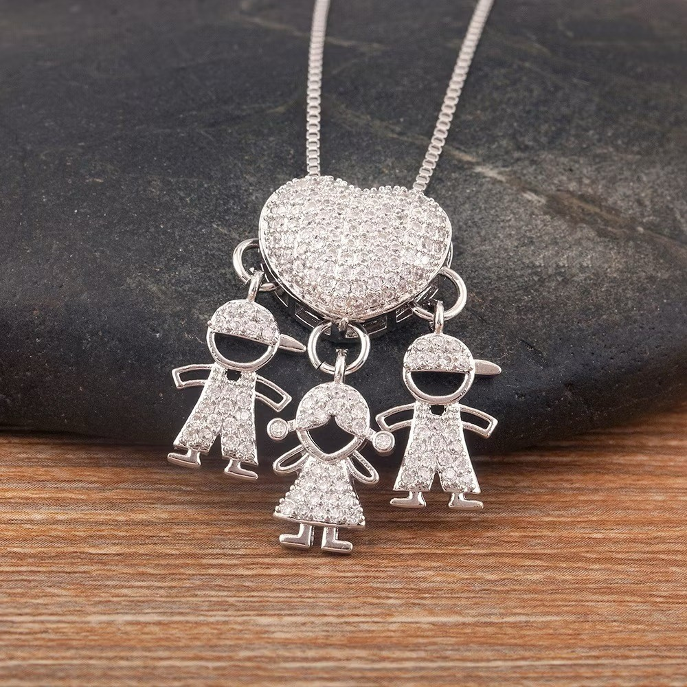 Colar Amor de Filhos™ – Pingente Coração com Menino/Menina em Microzircônias