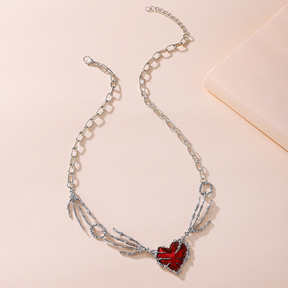 Colar feminino com pingente de caveira estilo punk, com garra, coração vermelho escuro, fashion, colar de clavícula